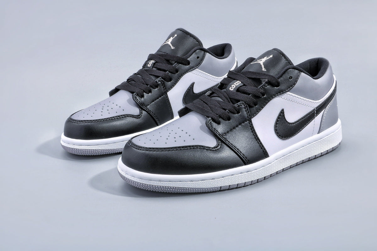 Black and Grey Jordan 1 Low Sneakers - product image from the listing.