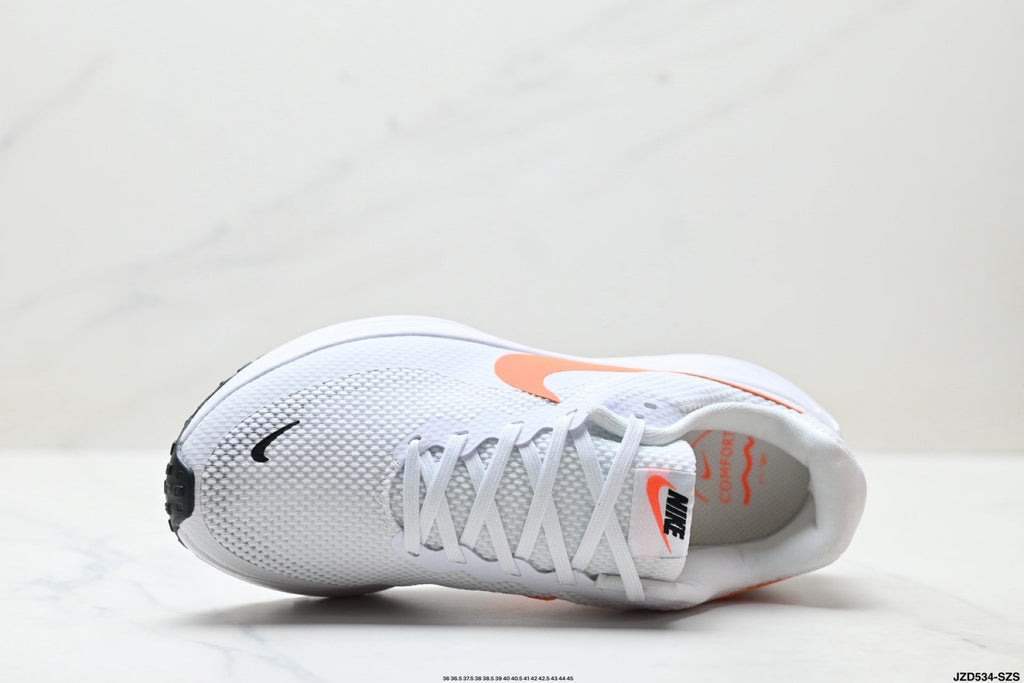 Nike Revolution 8 Running Shoes in White and Orange - product image from the listing.