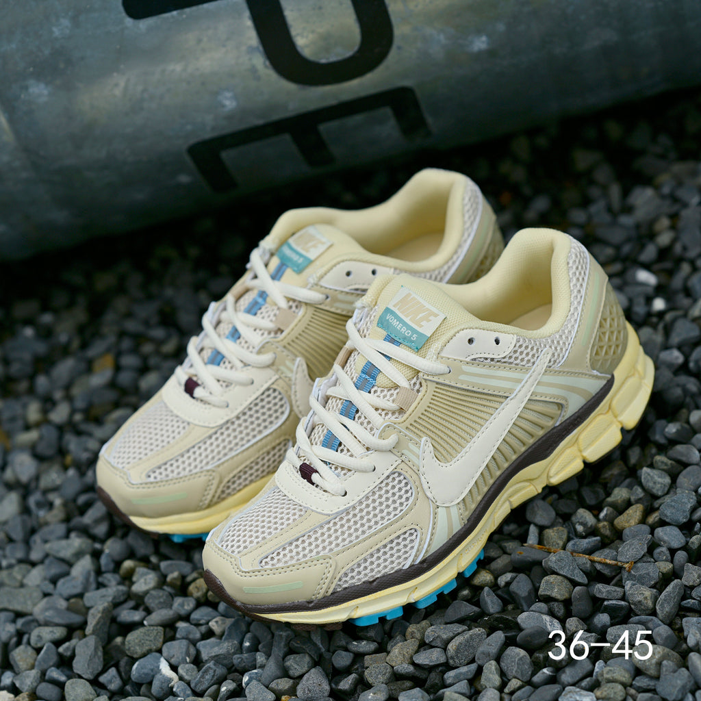 Pale Green and Blue Nike Air Zoom Vomero 5 Sneakers - product image from the listing.