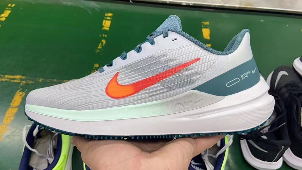 Nike Air Winflo 9 Running Shoes DD6203-005 in Gray Blue - product image from the listing.