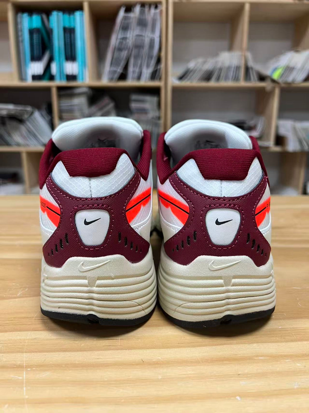 Nike P-9000 Sneakers in White and Burgundy IZ4751-100 - product image from the listing.