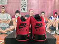 Jordan 6 Retro High-Top Sneakers in Red and Black - product image from the listing.