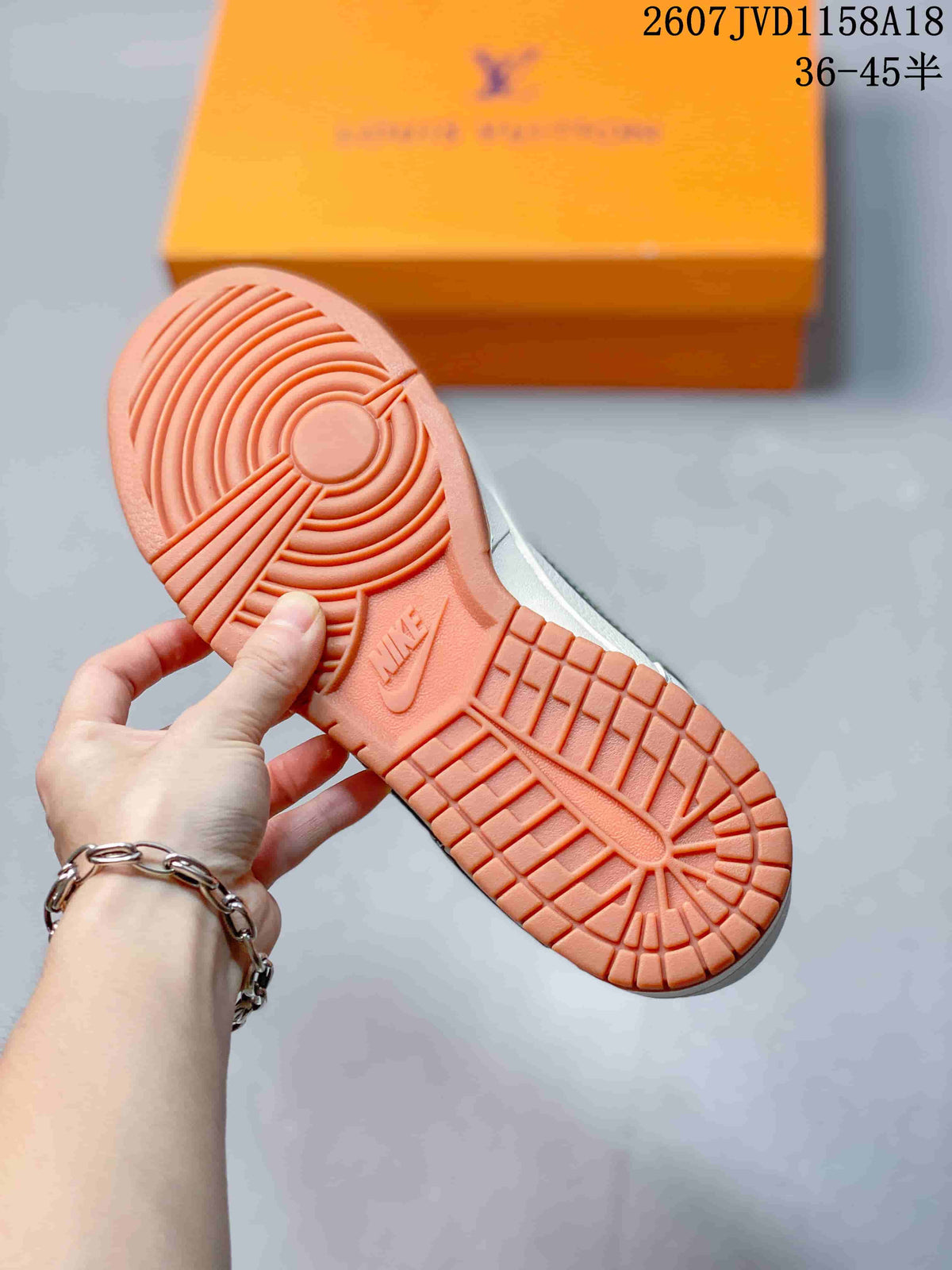 Nike SB Dunk Low Sneakers in White Green Gum 2607JVD1158A18 - product image from the listing.