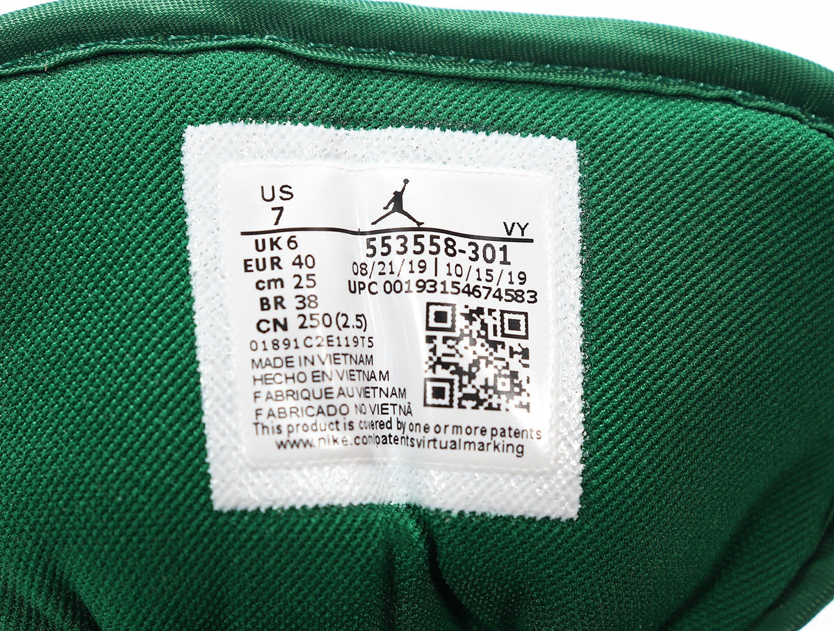 Air Jordan 1 Low White and Green Sneakers 553558-301 - product image from the listing.