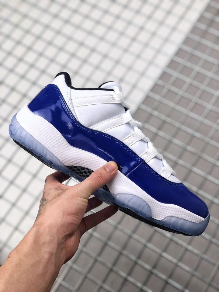 Air Jordan 11 Sneakers in White and Deep Blue BQ3685-001 - product image from the listing.