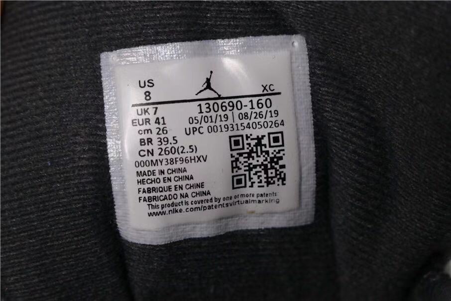 Air Jordan 12 Retro Dark Grey Sneakers in White Black - product image from the listing.