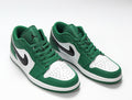 Jordan 1 Low Sneakers in White and Green 553558-301 - product image from the listing.