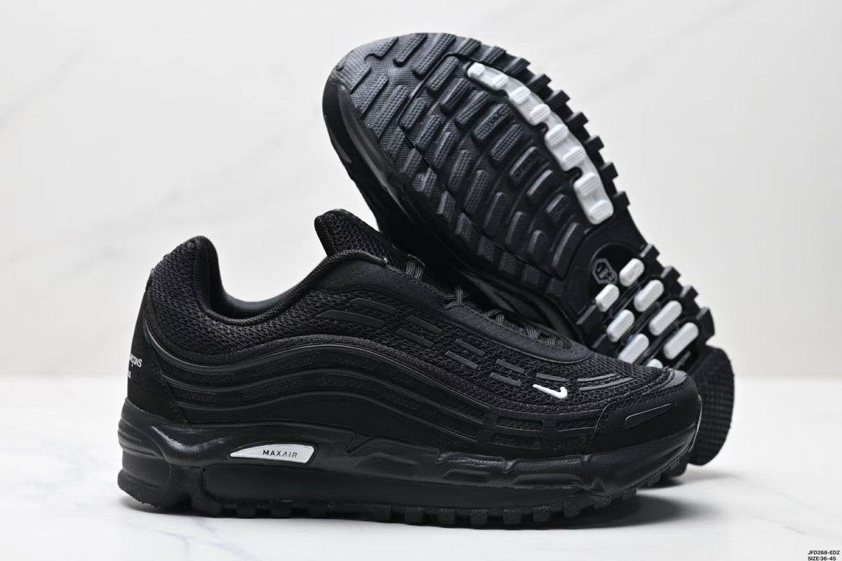 Nike Air Max Plus x Comme des Garçons Sneakers in Black - product image from the listing.