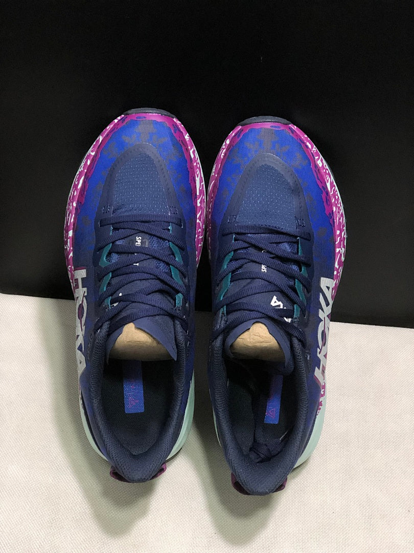 HOKA Speedgoat 6 Trail Running Shoes, in Blue and Pink - product image from the listing.