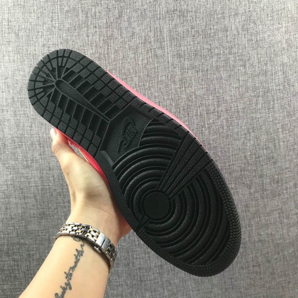 Air Jordan 1 Mid Sneakers in Pink Black Volt AQ9131-600 - product image from the listing.
