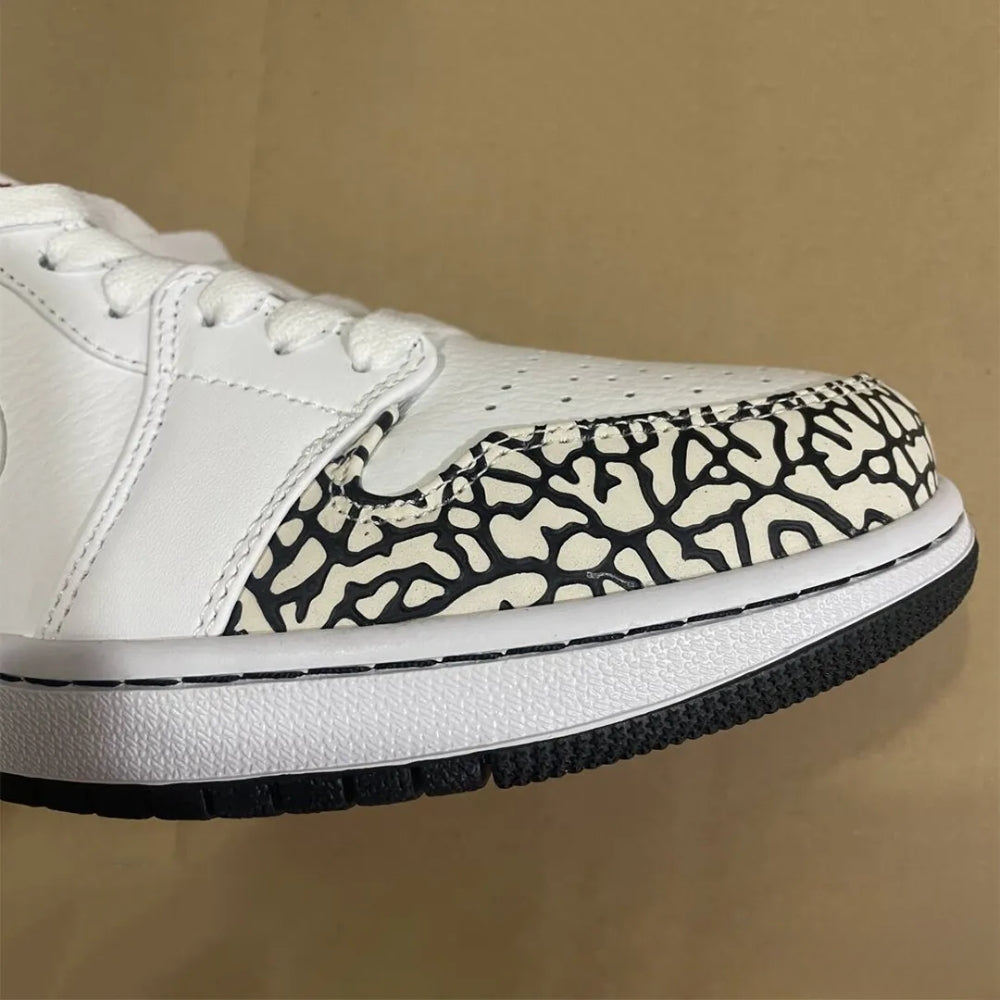 Phat Low Cement - Air Jordan 1 - product image from the listing.
