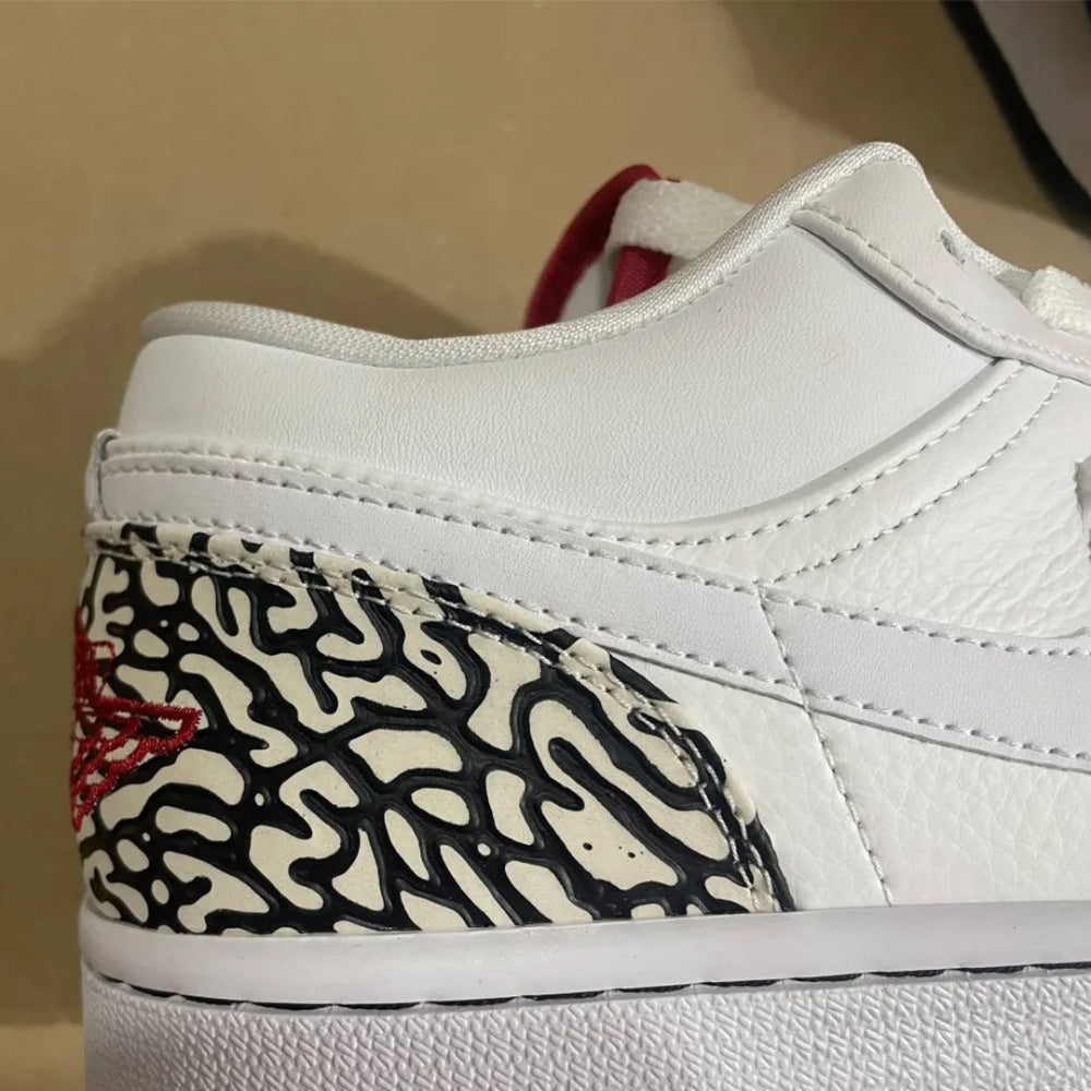 Phat Low Cement - Air Jordan 1 - product image from the listing.
