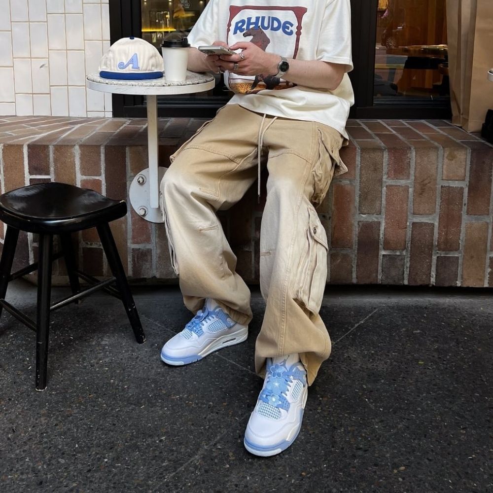 Air Jordan 4 Retro Forget Me Not in White Blue - product image from the listing.