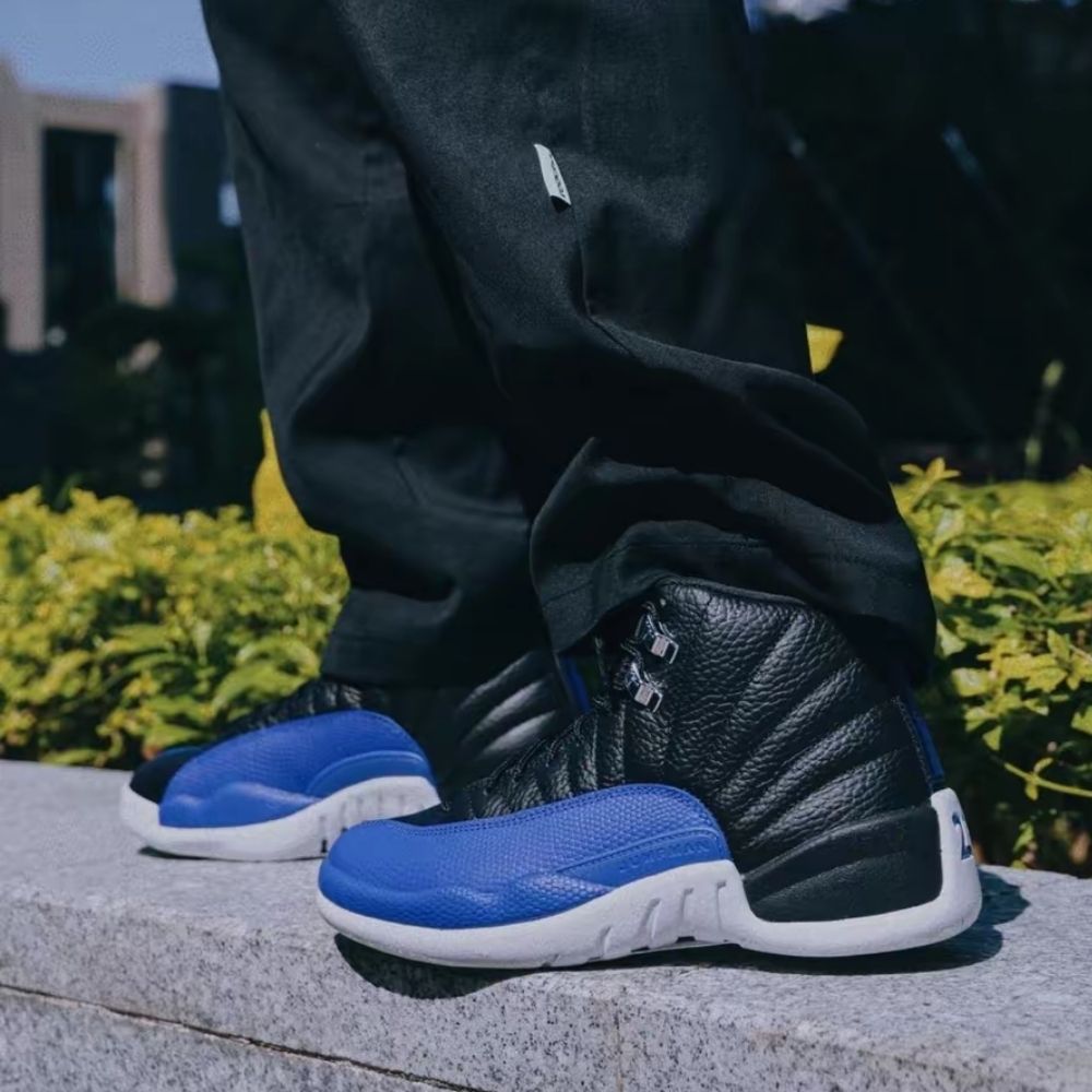 Air Jordan 12 Retro in Hyper Royal Black - product image from the listing.