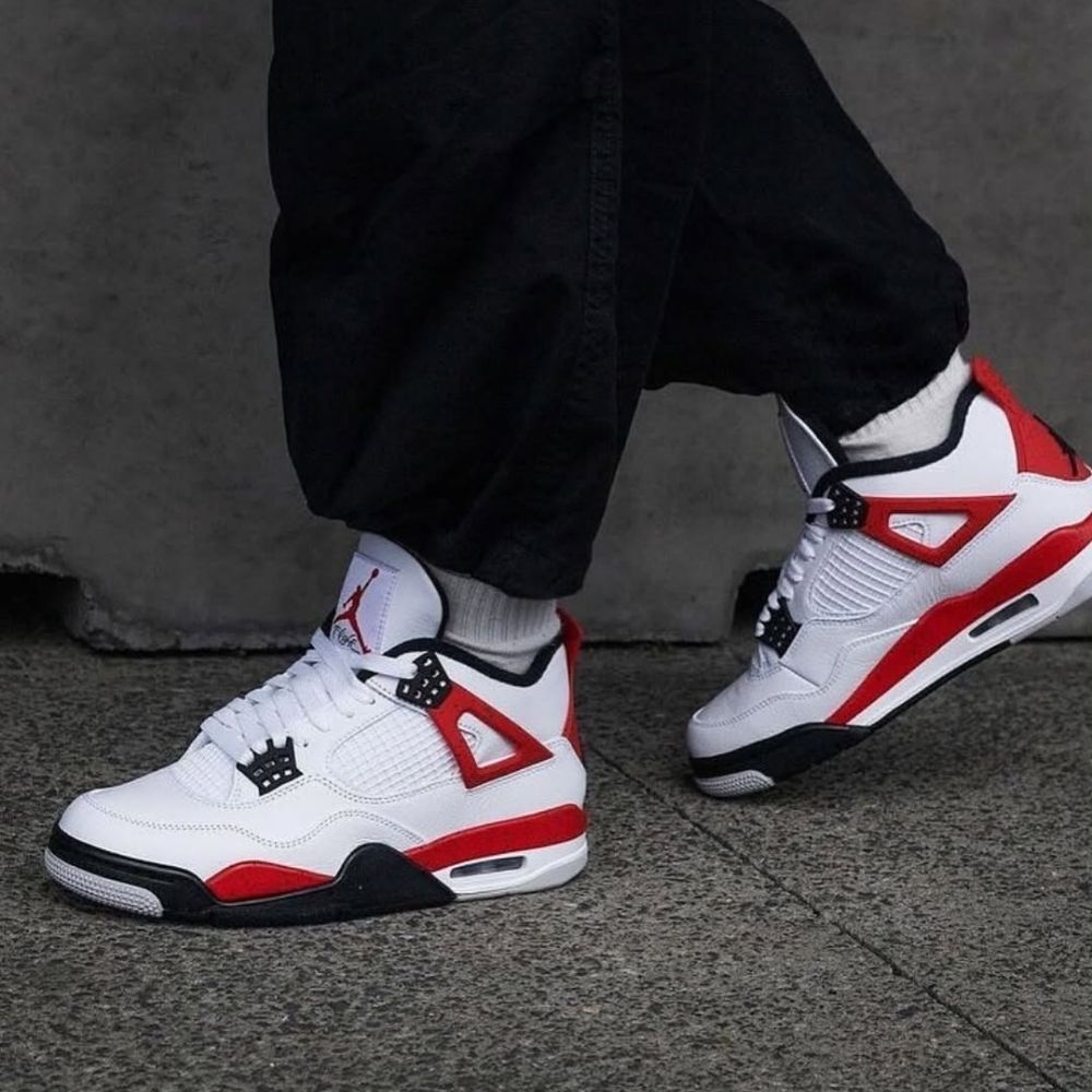 Red Cement - Air Jordan 4 Retro - product image from the listing.