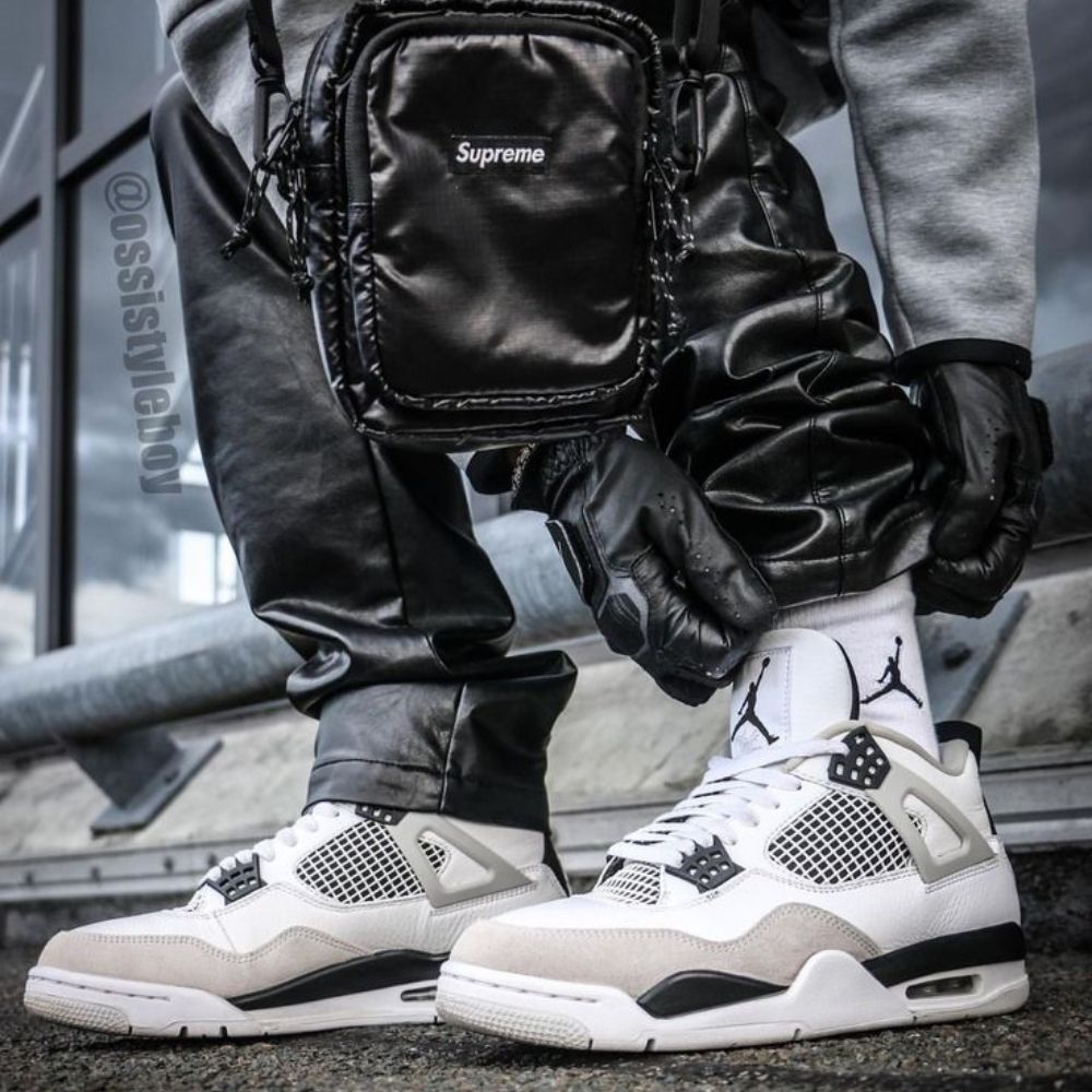 Air Jordan 4 Retro Military in Black - product image from the listing.