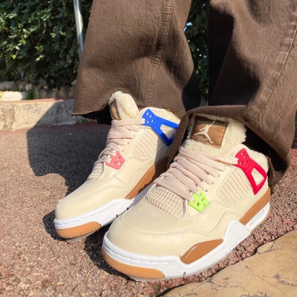 Air Jordan 4 Retro Wild Things in Pearl White - product image from the listing.