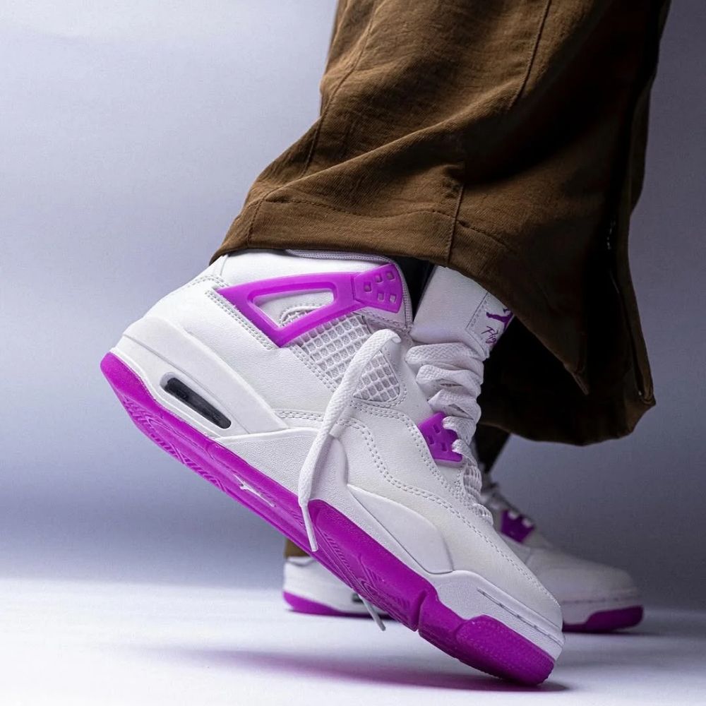 Air Jordan 4 Retro in Hyper Violet - product image from the listing.