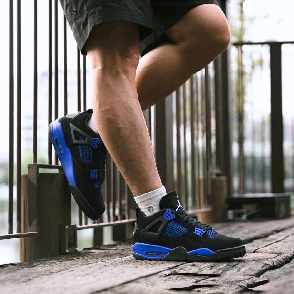 Air Jordan 4 Retro Game in Royal Blue - product image from the listing.