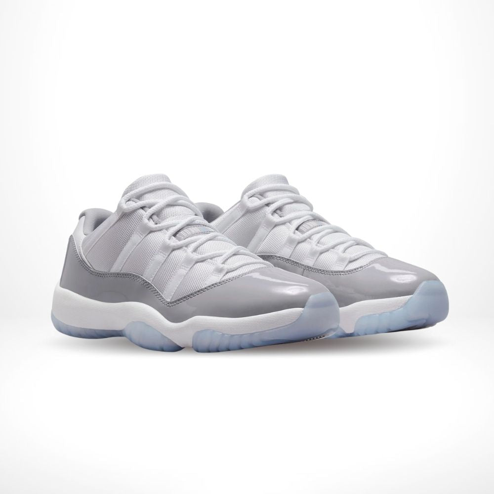 Air Jordan 11 Retro Low Cement in Grey - product image from the listing.