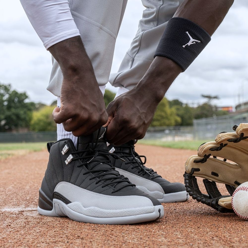 Air Jordan 12 Retro Barons in Black Wolf Grey - product image from the listing.