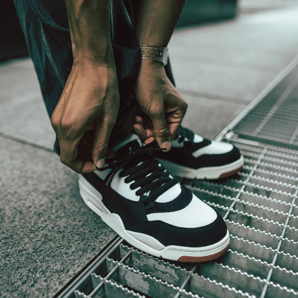 RM Canyon Rust Black White Coconut Milk - Air Jordan 4 - product image from the listing.