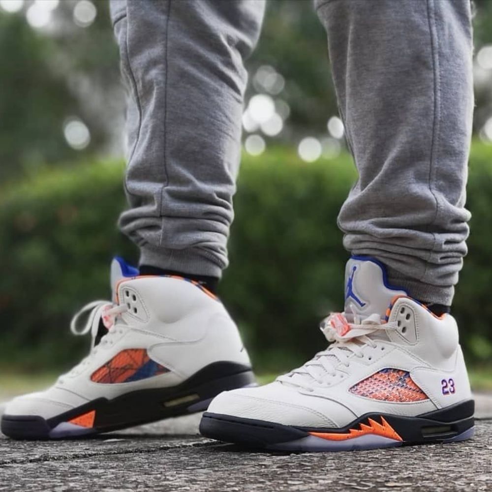 Air Jordan 5 Retro International Flight in Sail Orange - product image from the listing.