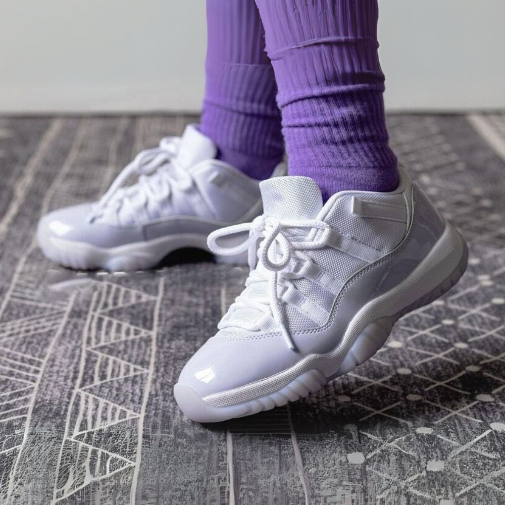 Air Jordan 11 Low in Pure Violet White - product image from the listing.