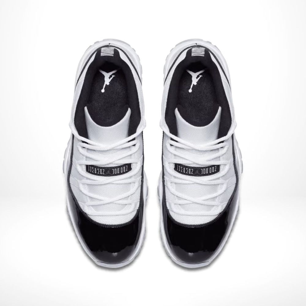Air Jordan 11 Retro Low Concord in White - product image from the listing.