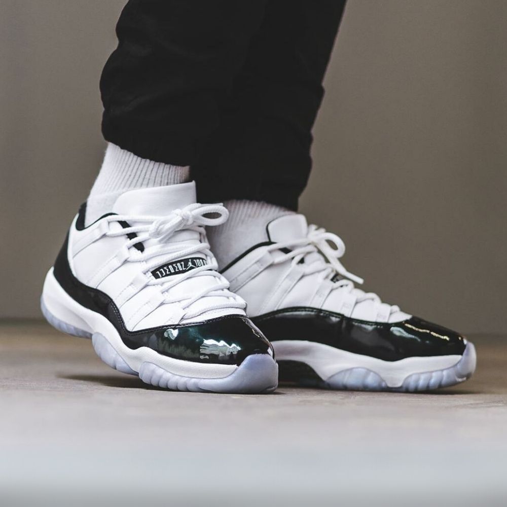 Air Jordan 11 Retro Low Concord in White - product image from the listing.