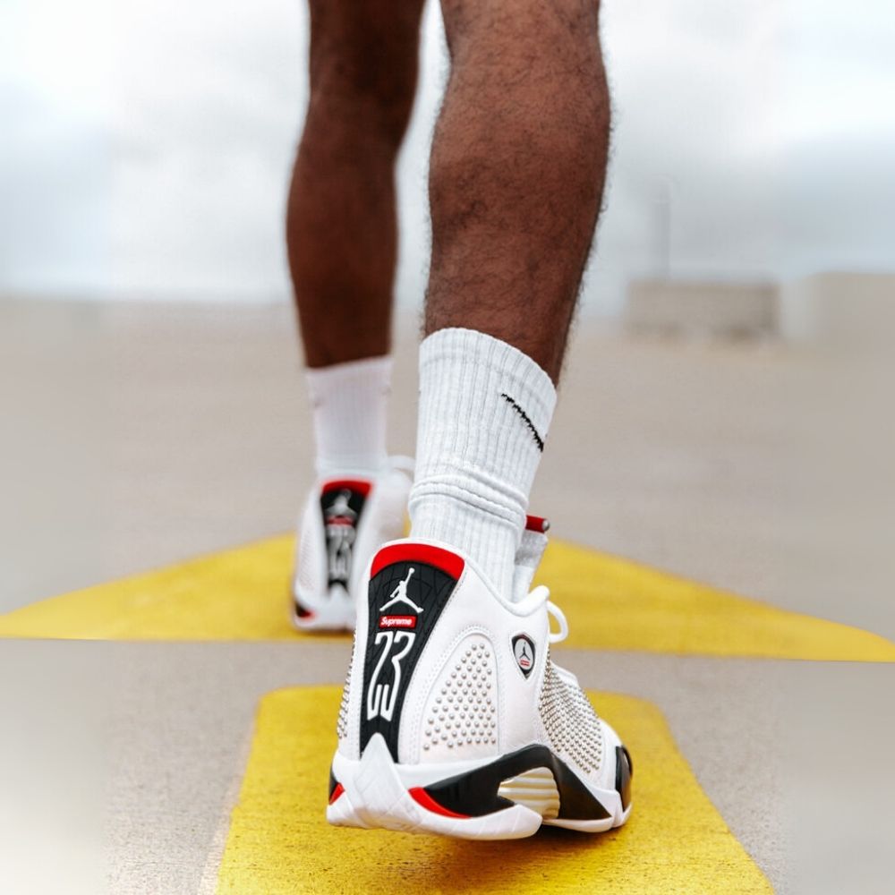 Air Jordan 14 Retro X Supreme in White Black - product image from the listing.