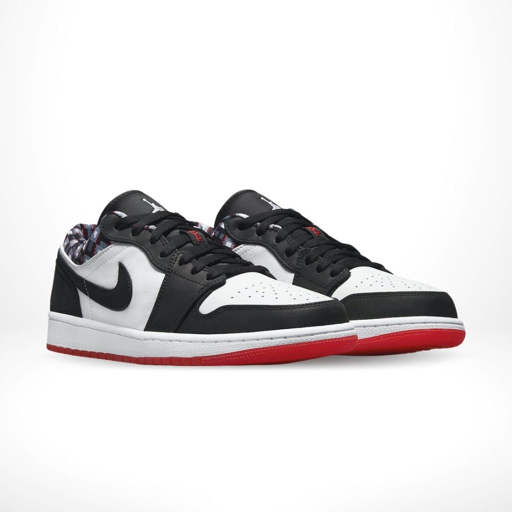 Air Jordan 1 Low Quai 54 in Black White - product image from the listing.