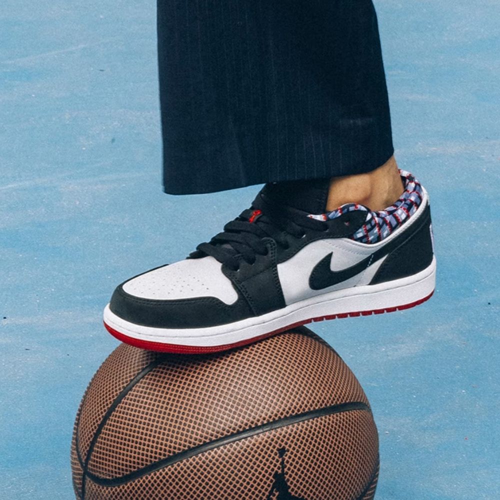 Air Jordan 1 Low Quai 54 in Black White - product image from the listing.