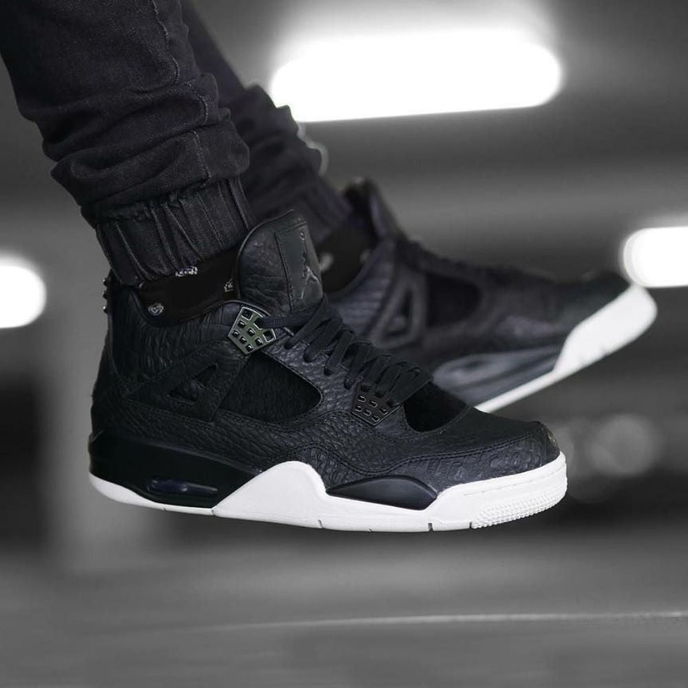 Air Jordan 4 Retro Pony Hair in Black Sail - product image from the listing.