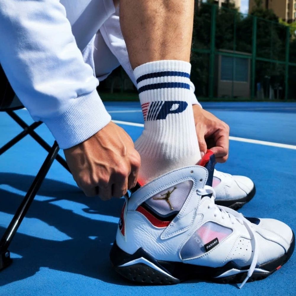 Air Jordan 7 Retro Paris Saint-Germain White College in Navy - product image from the listing.
