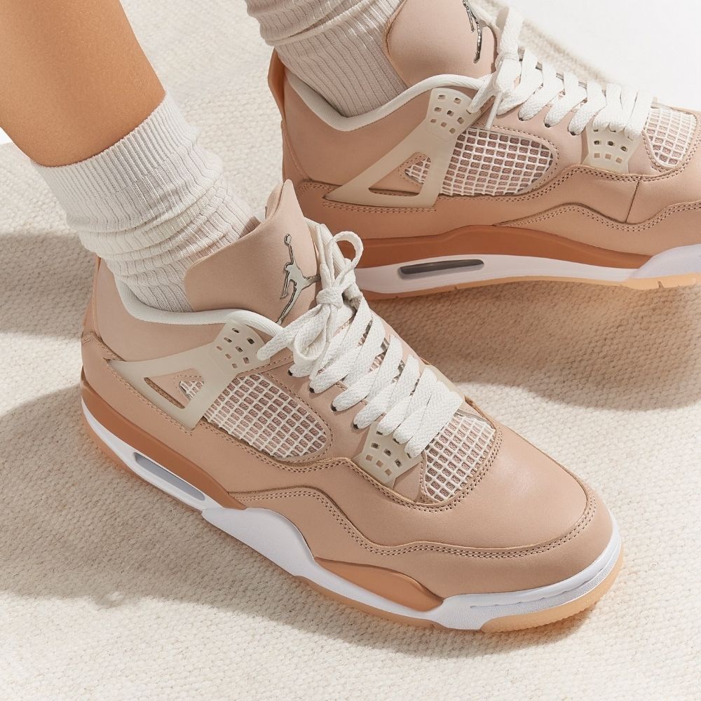 Air Jordan 4 Retro Shimmer in Metallic Silver Orange - product image from the listing.
