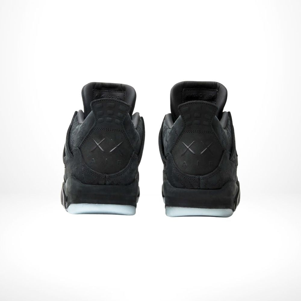 Air Jordan 4 Retro X Kaws in Black - product image from the listing.