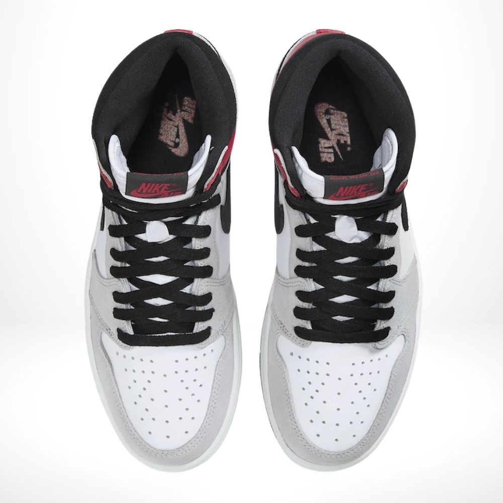 Air Jordan 1 Retro High in Light Smoke Grey - product image from the listing.