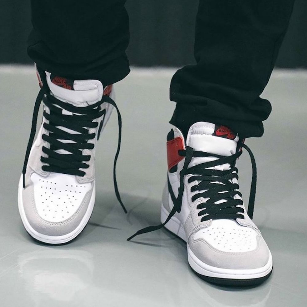 Air Jordan 1 Retro High in Light Smoke Grey - product image from the listing.