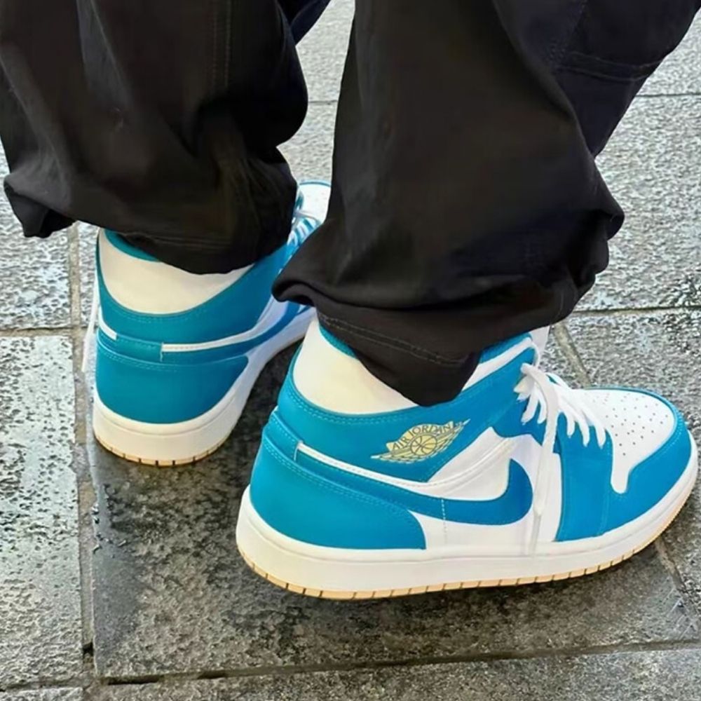 Air Jordan 1 Mid Aquatone in Blue White - product image from the listing.