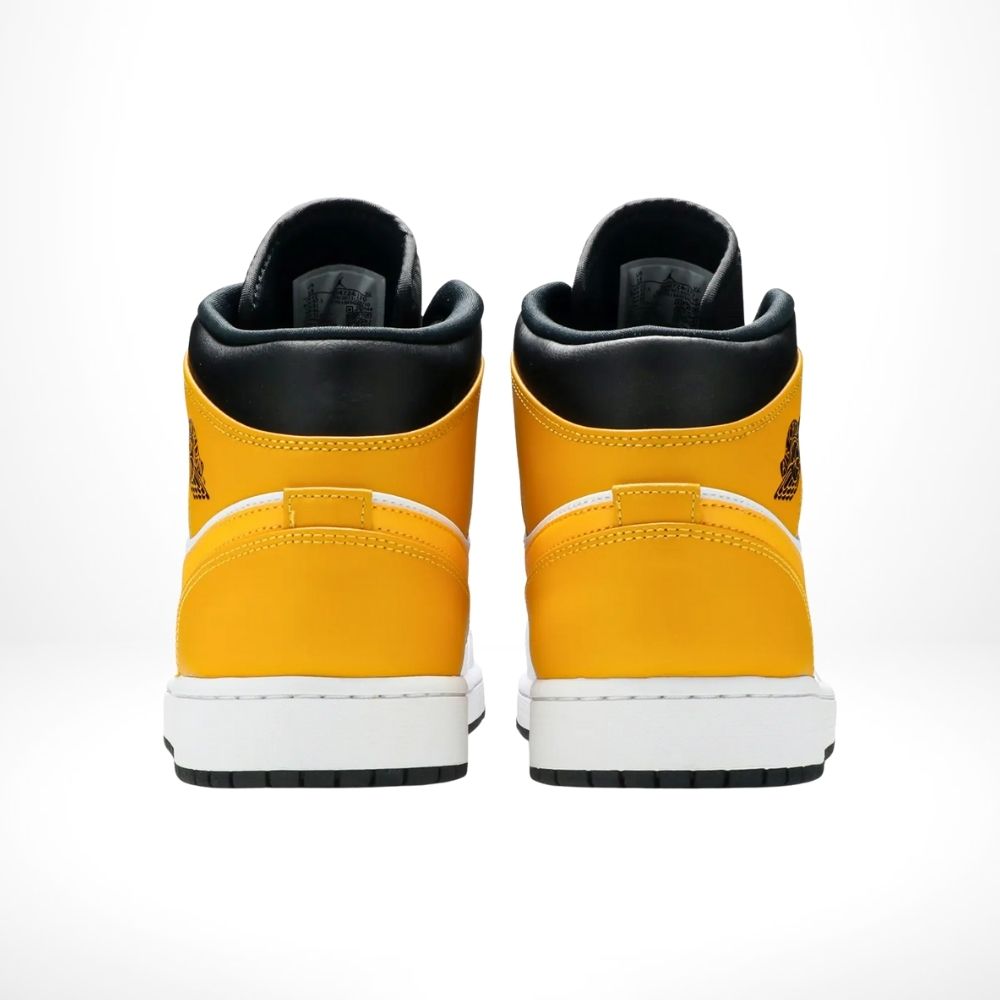Air Jordan 1 Mid in University Gold White Black - product image from the listing.