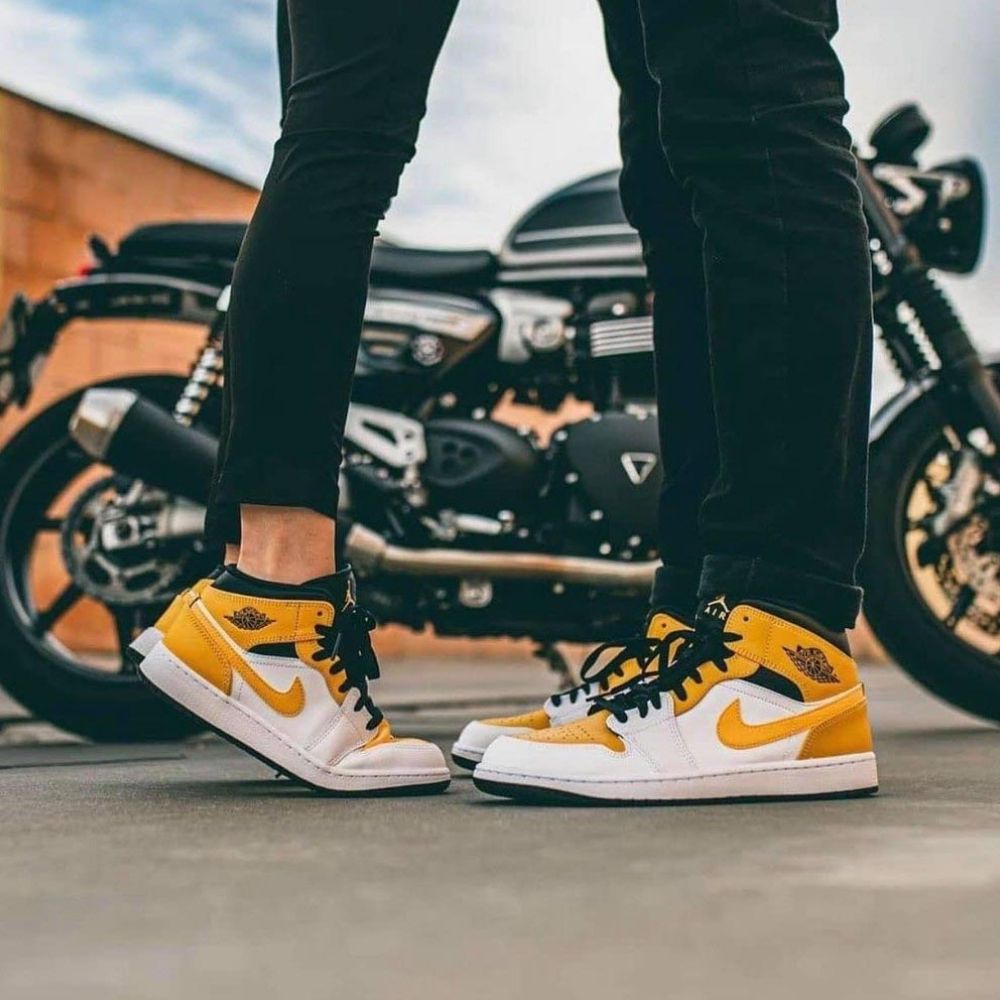 Air Jordan 1 Mid in University Gold White Black - product image from the listing.