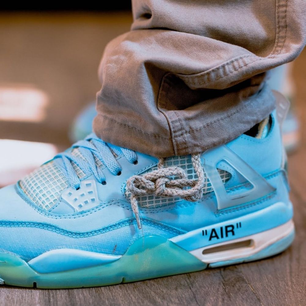 Air Jordan 4 X in Off White Ice Blue - product image from the listing.
