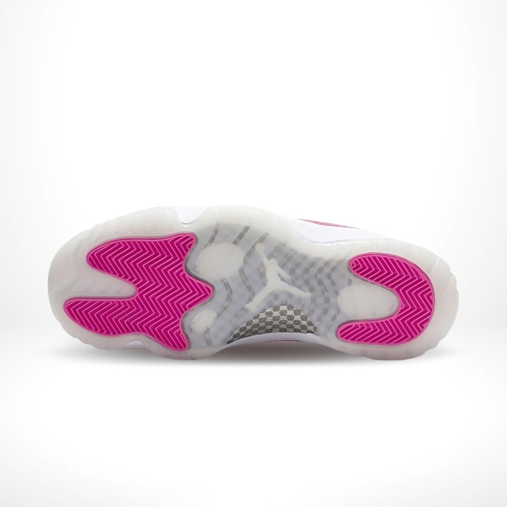 Air Jordan 11 Low Pink Snakeskin in White - product image from the listing.