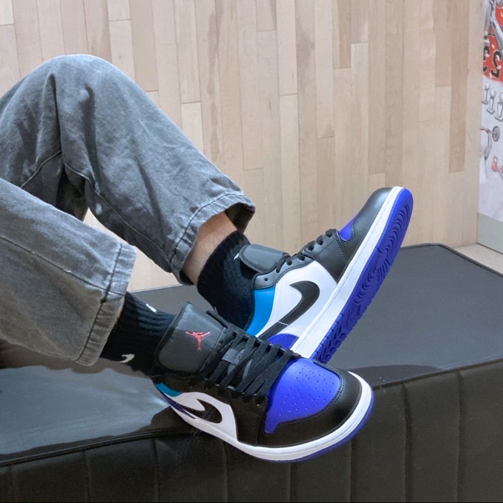Air Jordan 1 Low in Aqua Purple Black - product image from the listing.