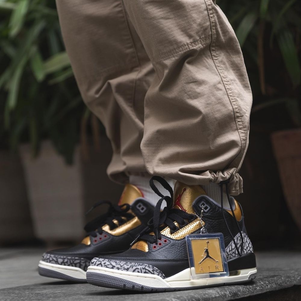 Air Jordan 3 Retro Black Cement in Gold - product image from the listing.
