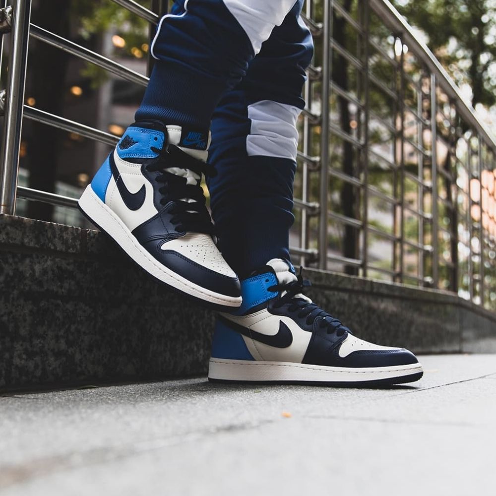 Air Jordan 1 Retro High OG Obsidian in Sail Blue - product image from the listing.
