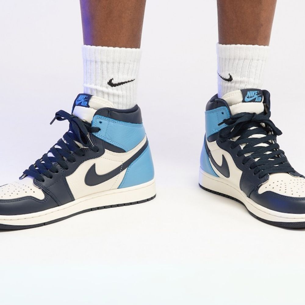 Air Jordan 1 Retro High OG Obsidian in Sail Blue - product image from the listing.