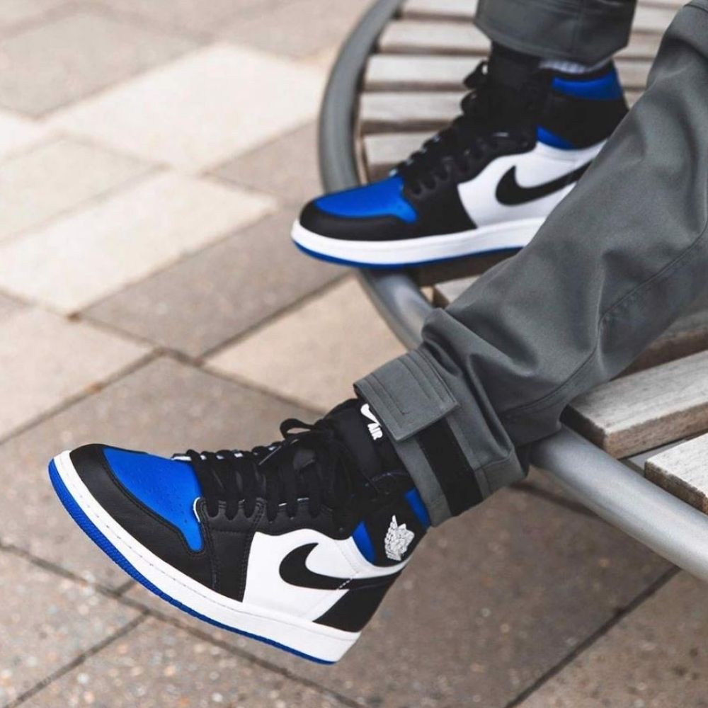 Air Jordan 1 Retro High OG Royal Toe in Blue Black - product image from the listing.