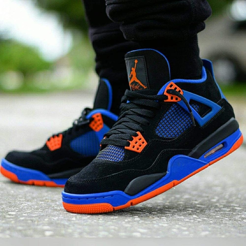 Air Jordan 4 Retro Cavs in Black Blue - product image from the listing.